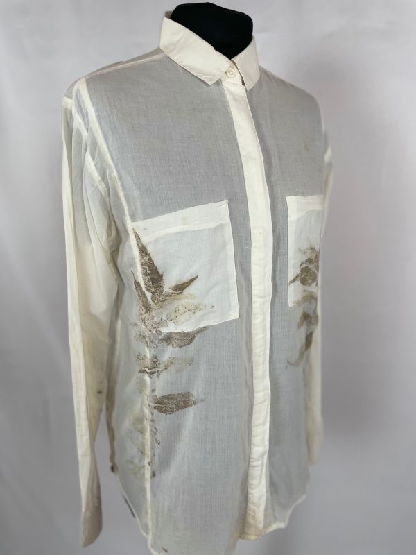 Pure fine cotton white shirt eco printed with two striking sumac leaves on the front. Two front pockets and a covered button band