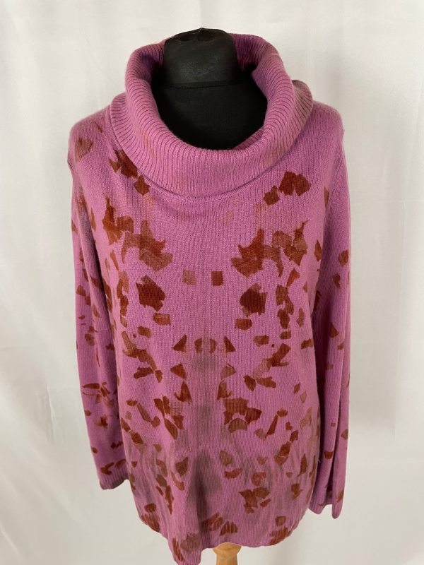 A pure merino wool and cashmere pink roll neck jumper originally manufactured by Woolovers.  Eco printed with onion skins.